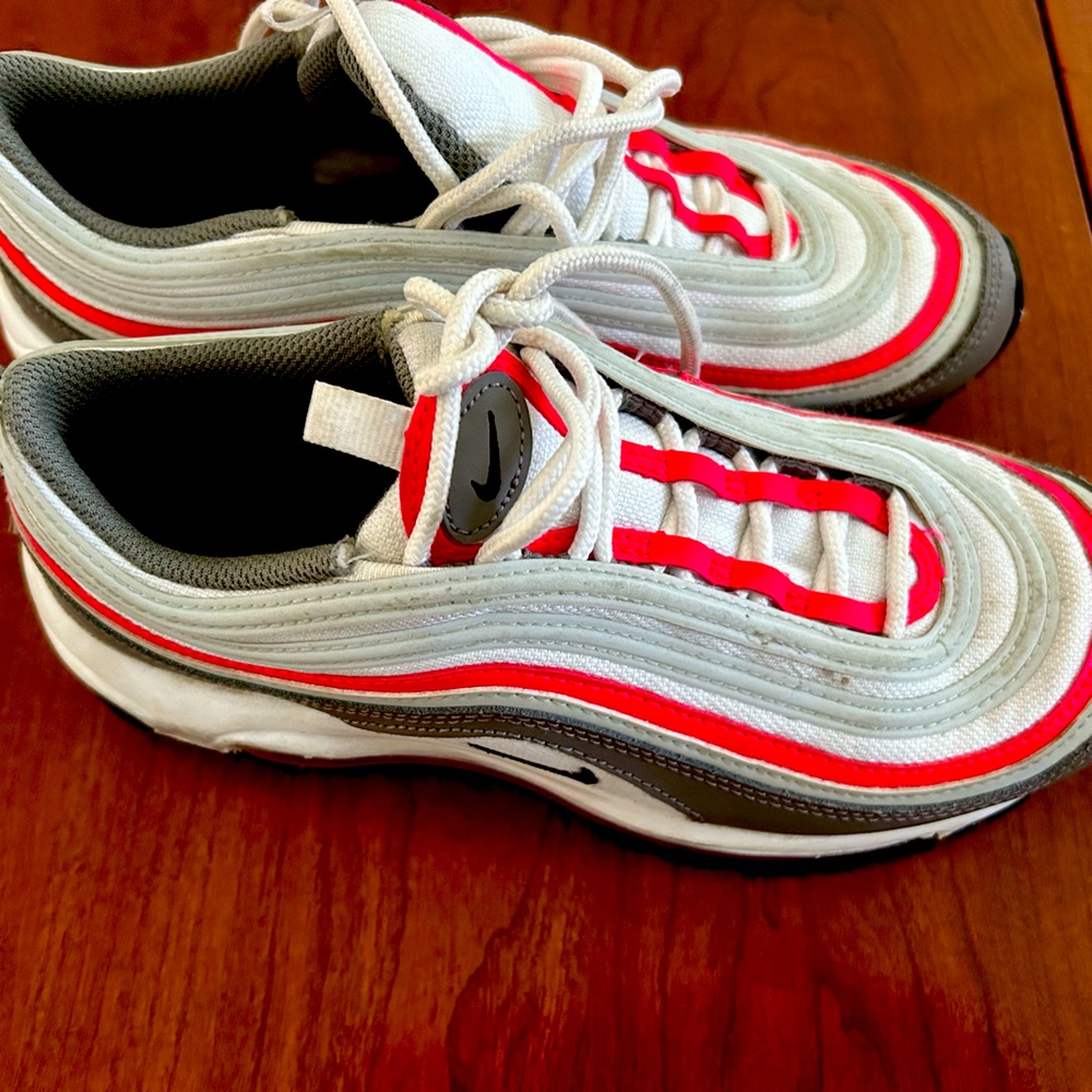 Nike Air Max. Worn 3x and outgrew. Silver and a hot pink/red color